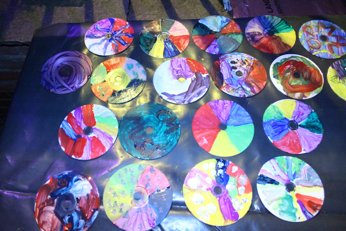 A small selection of CDs painted as part of the community sculpture public interaction event held by artist Laury Dizengremel during the finale evening of the Gravity Fields Festival