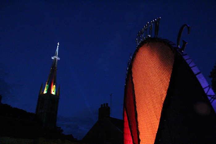St Wulframs Church and its magic lightshow highlighted against the sky near Isaac Newton Colour Circle artwork installation