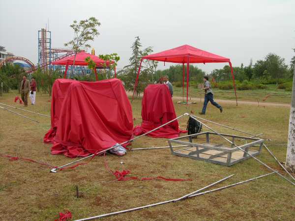 I walked onto the site on day four and suddenly realized my tent had blown down and covered the stands and lifesize busts I had started to make....