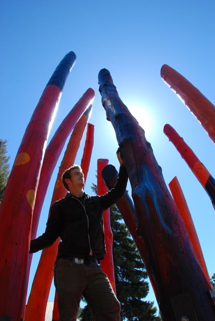 Visitor and assistant in the Log Henge making process: Jeff Ransom, posing here in the completed public artwork on the day the dedication ceremony took place