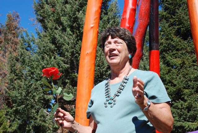 Fellow artist Merrily Dunham and President of Alpine Artisans, Inc a local artist association speaks at the dedication / opening ceremony