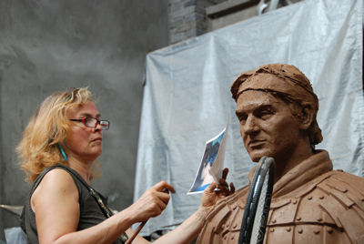 Award-winning sculptor Laury Dizengremel at work on one of her figurative sculptures - a Tennis Terracotta Warrior for the ATP and Master Cup Shanghai